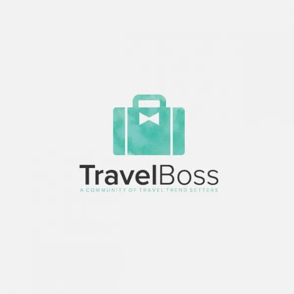 Green suitcase with a bow shape on it