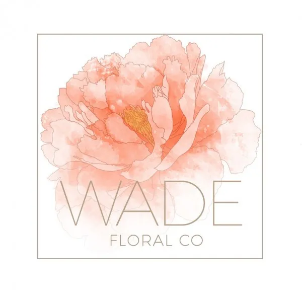 Words “Wade floral co” with a large, coral-colored flower