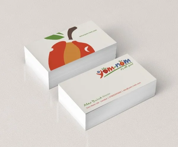 white business card with red apple