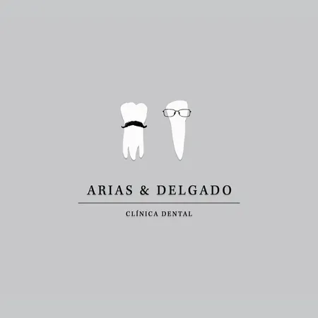 arias & delgado funny tooth dental logo